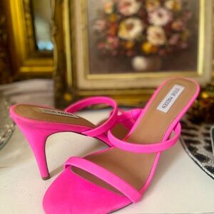 Pretty in pink heel sandals.